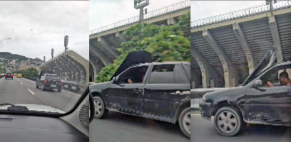 VÍDEO: carro circula com capô aberto, e motociclista pilota segurando objeto na Ponte